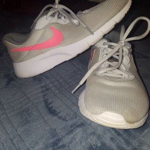 Grey and orange Nikes